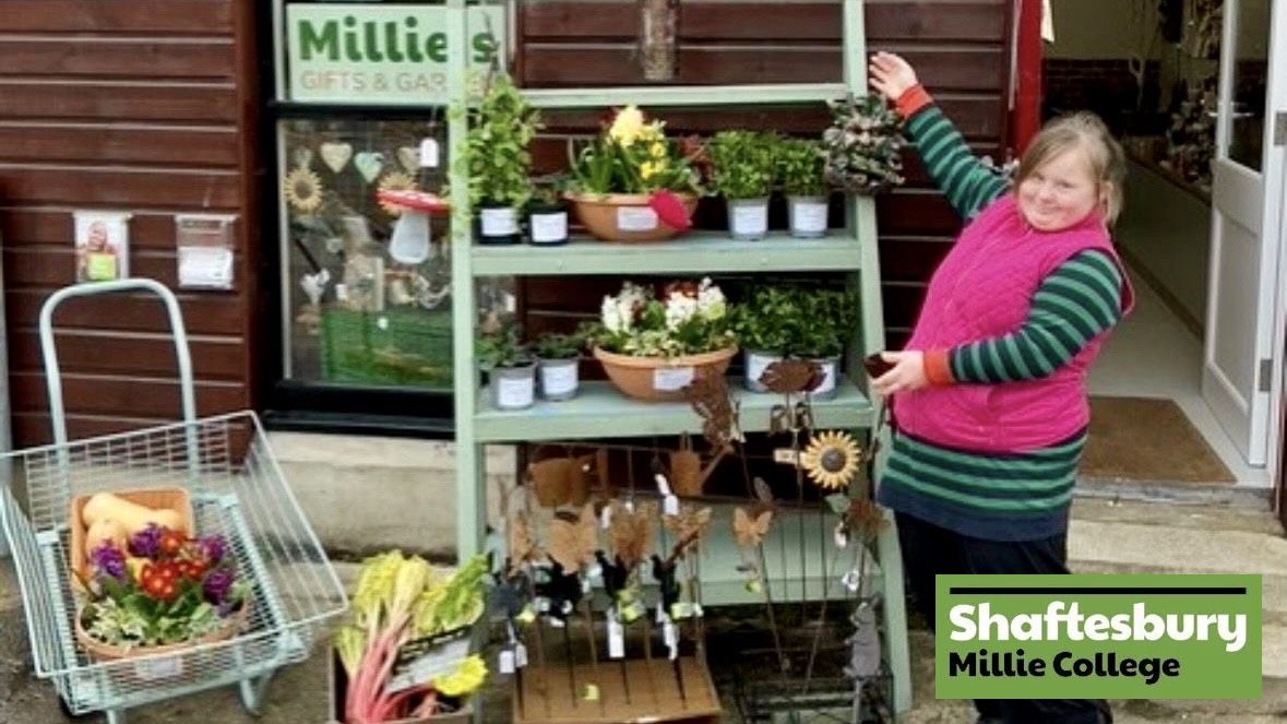 Student outside Millie's shop