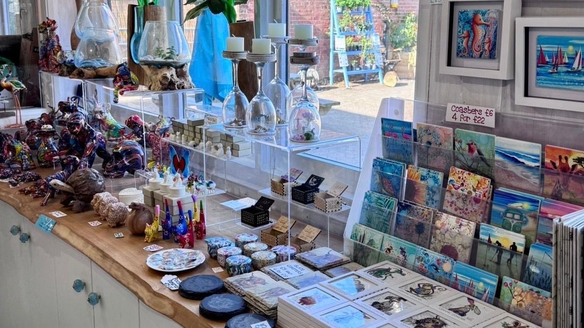 Sarah Storm shop interior showing coasters and home decor